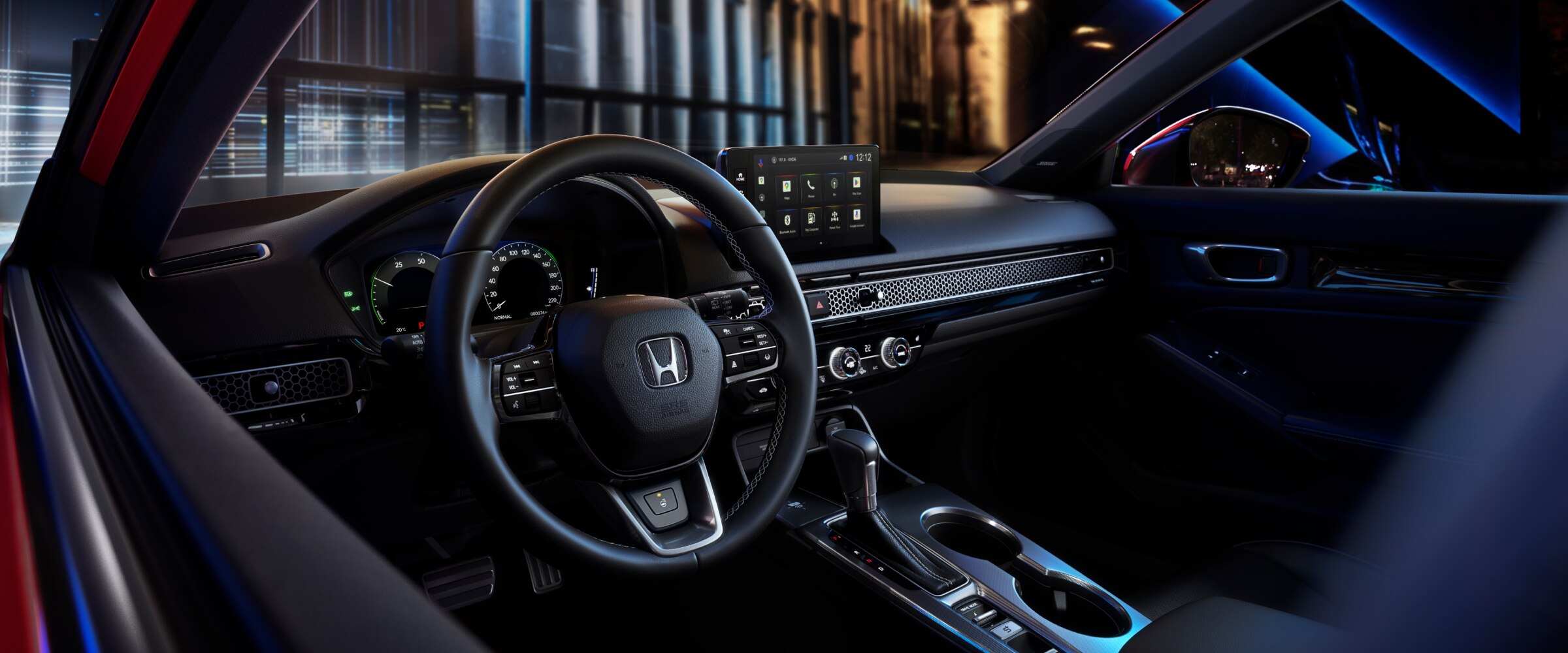 Interior view of steering wheel and cabin.