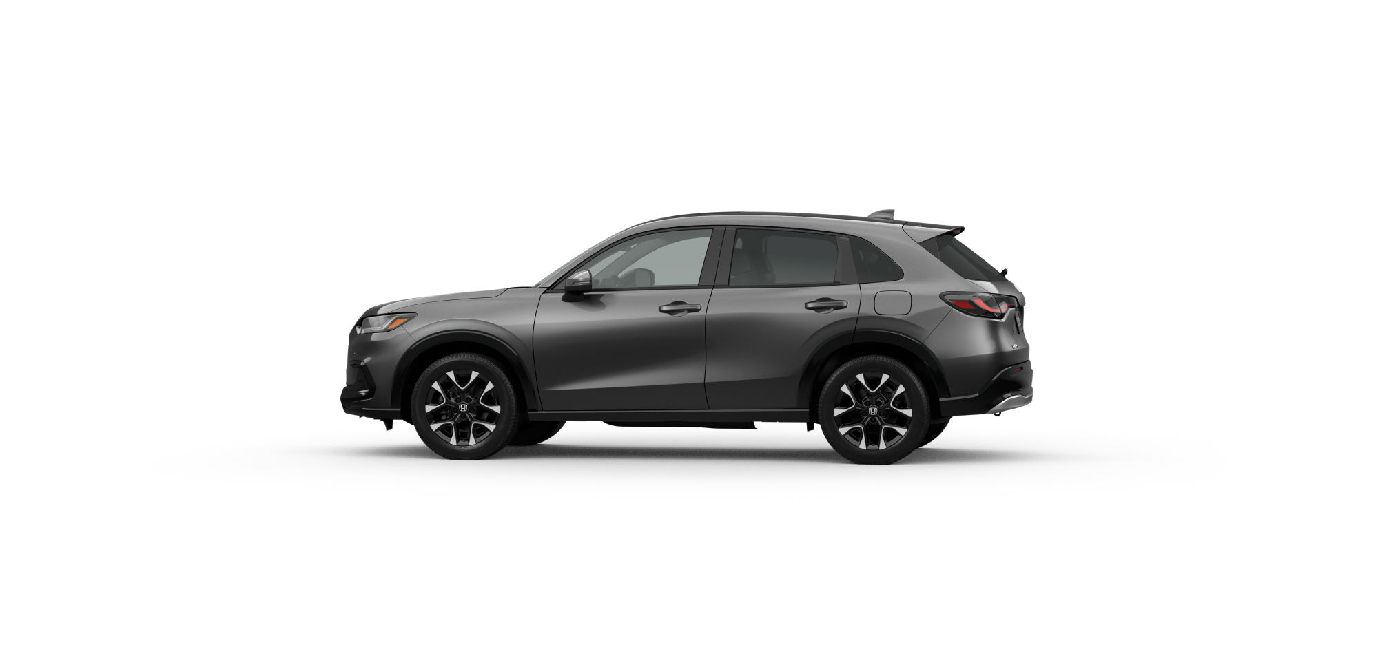 Vue latérale du côté conducteur de la HR-V EX-L 2026 de couleur acier moderne métallisésur fond blanc.