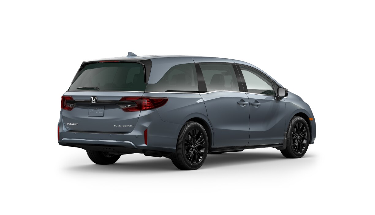 3/4 back view of blueish grey Odyssey on white space.