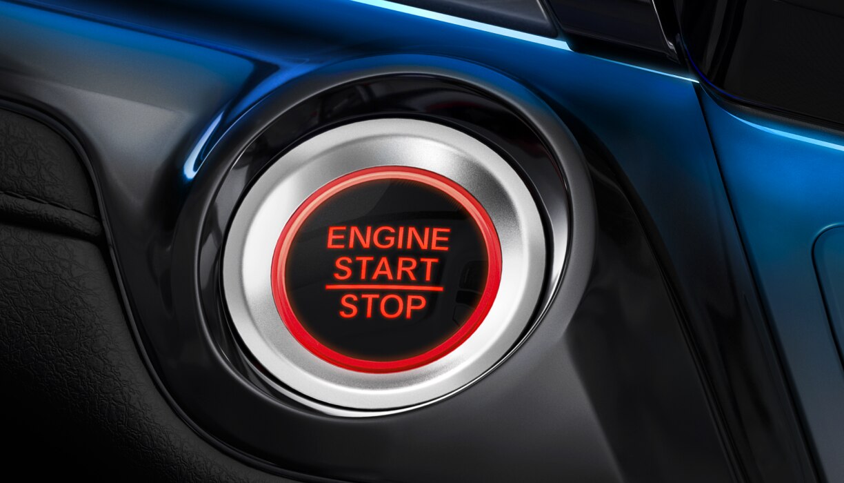 Gros plan du bouton de démarrage du moteur.