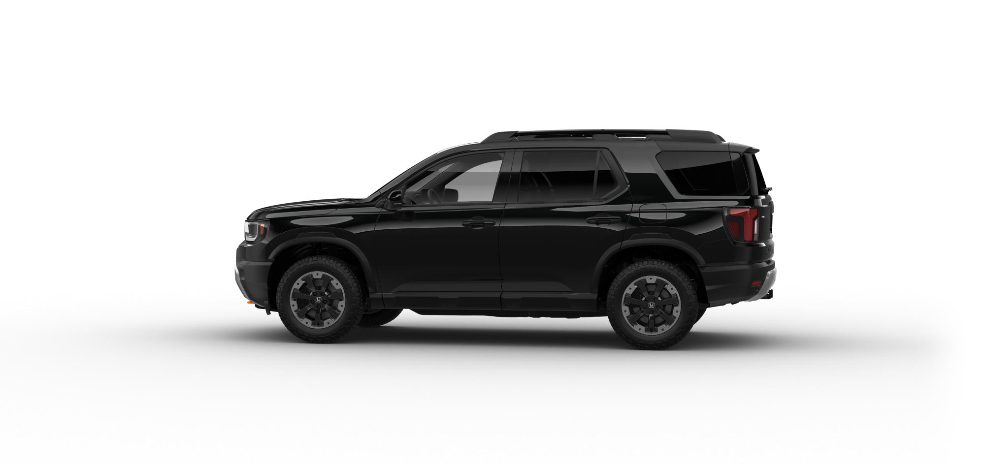Vue latérale du côté conducteur de la Passport Trailsport Touring 2026 de couleur noir cristal nacré sur fond blanc.
