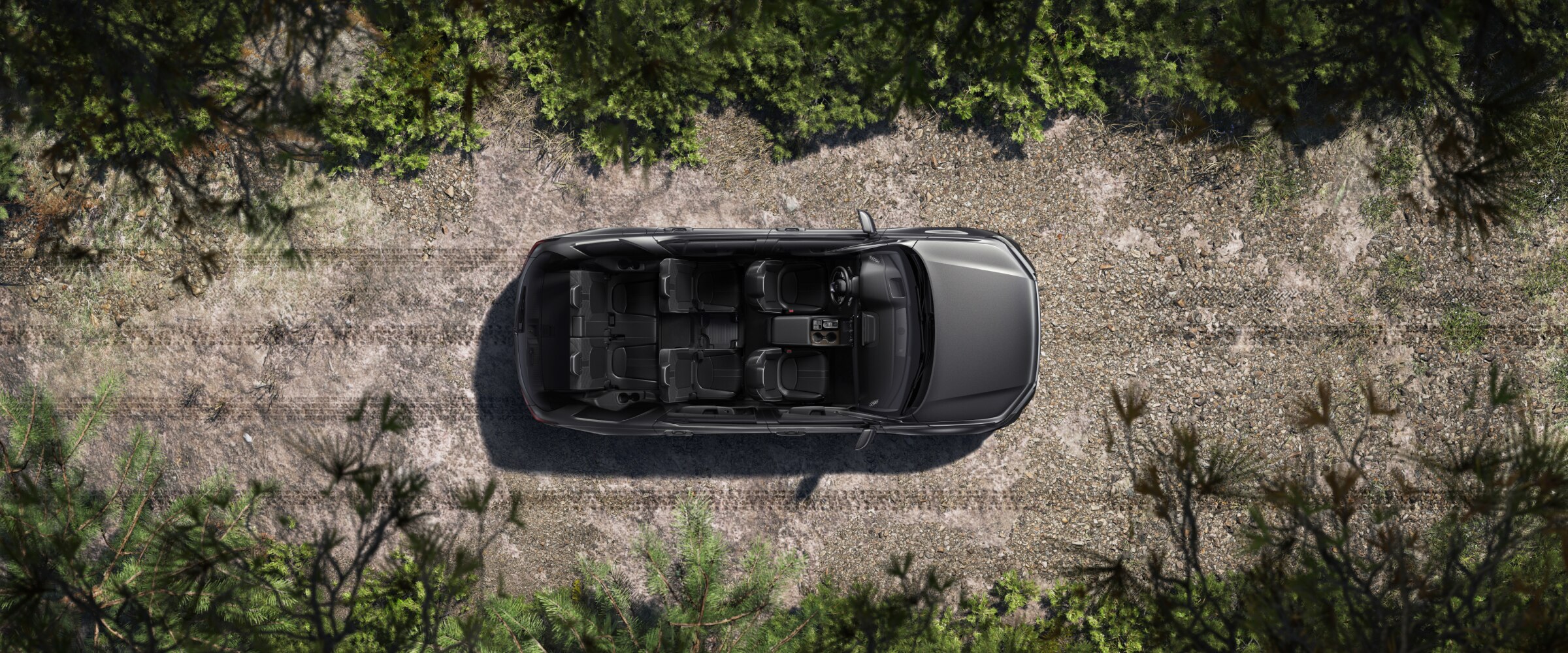Top-down view of a grey Pilot with the roof removed, showcasing its interior.