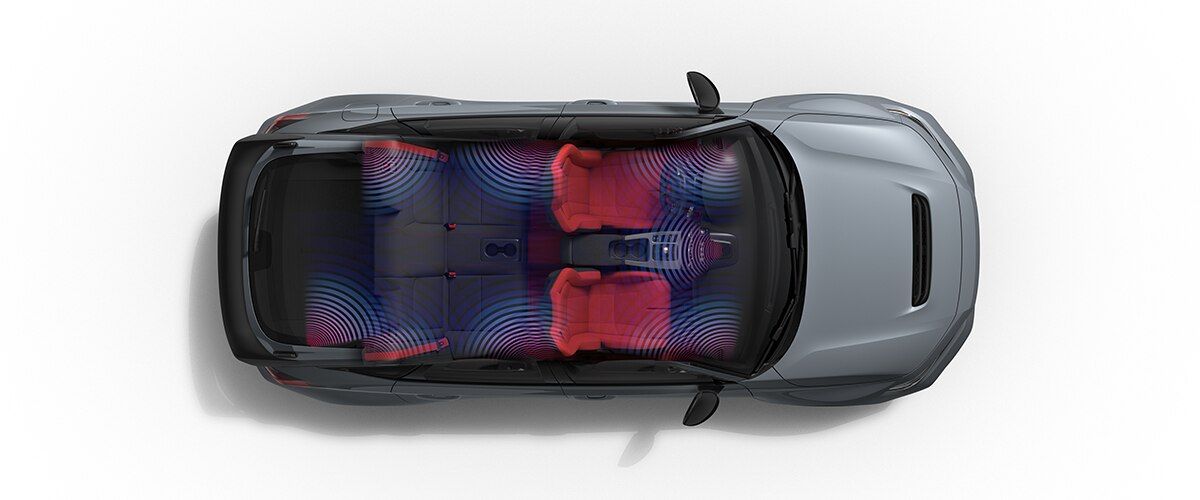 Bird's eye view of grey Type R on white space with no roof. Blue/purple waves emitting, indicate where all the BOSE® speakers are. 