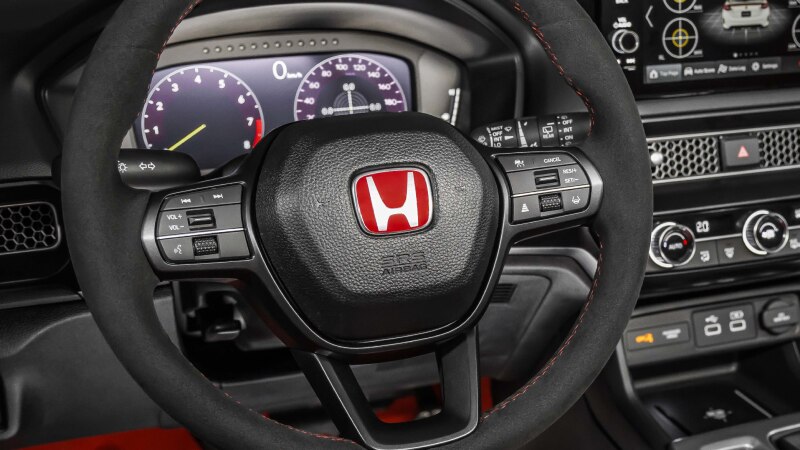 Closeup of steering wheel. 