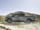 Side view of grey Ridgeline on desert hills.